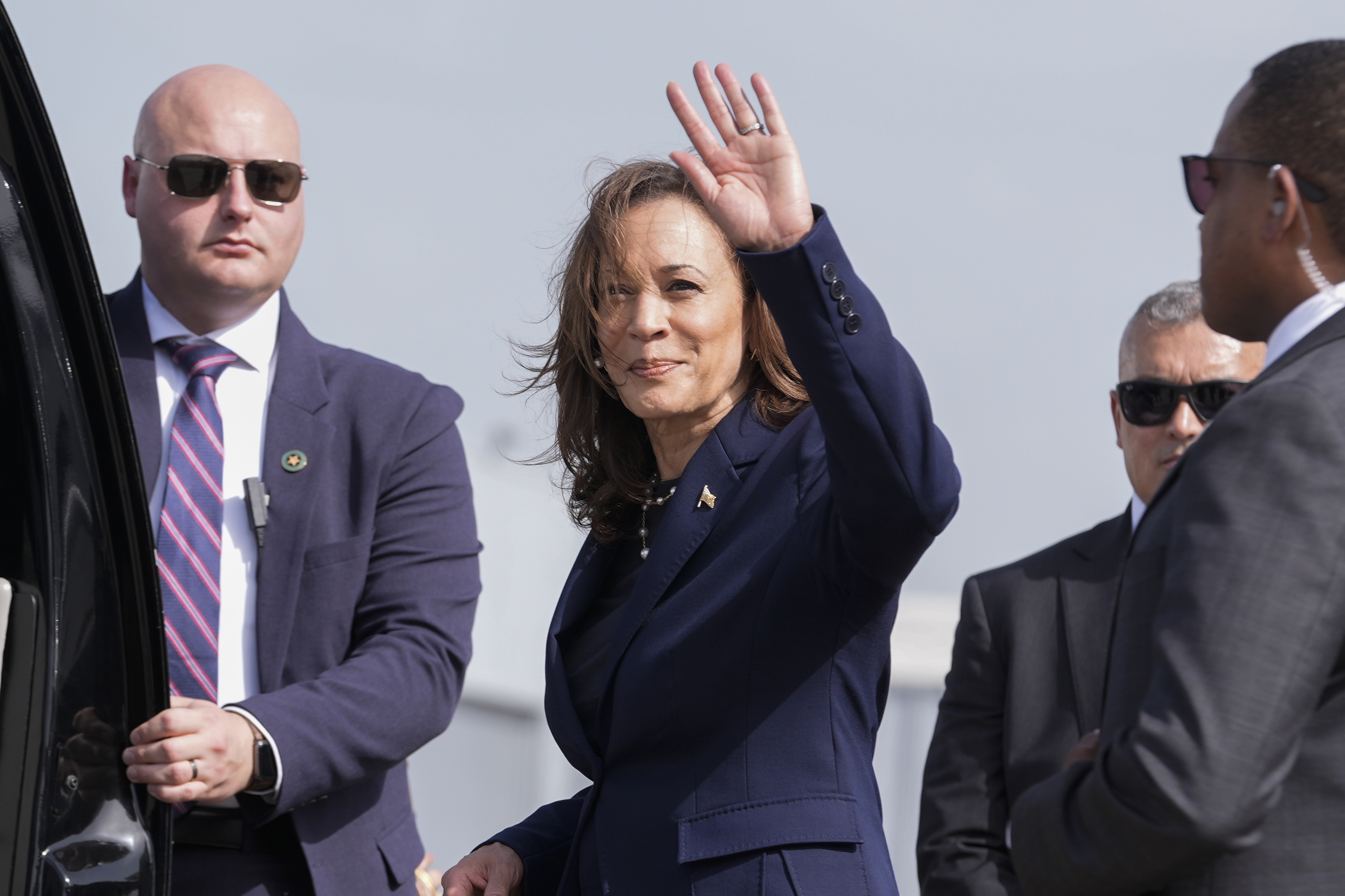 Vice President Kamala Harris waving as she walks across the tarmac during her arrival, Wednesday, July 31, 2024, in Houston. Vice President Kamala Harris waving as she walks across the tarmac during her arrival, Wednesday, July 31, 2024, in Houston.