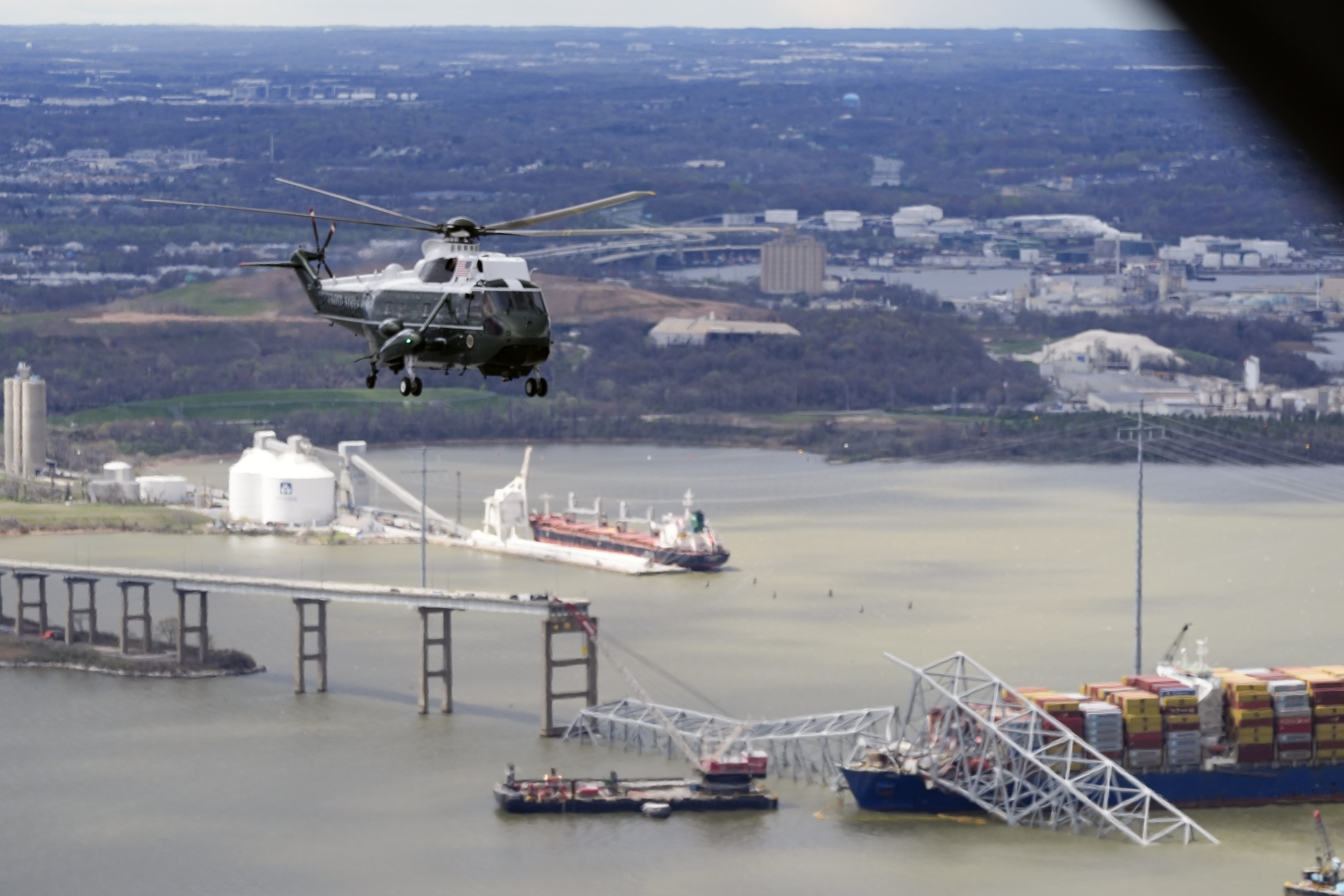 President Joe Biden, aboard Marine One, takes an aerial tour of the collapsed Francis Scott Key Bridge in Baltimore, April 5, 2024, as seen from an accompanying aircraft. President Joe Biden, aboard Marine One, takes an aerial tour of the collapsed Francis Scott Key Bridge in Baltimore, April 5, 2024, as seen from an accompanying aircraft.