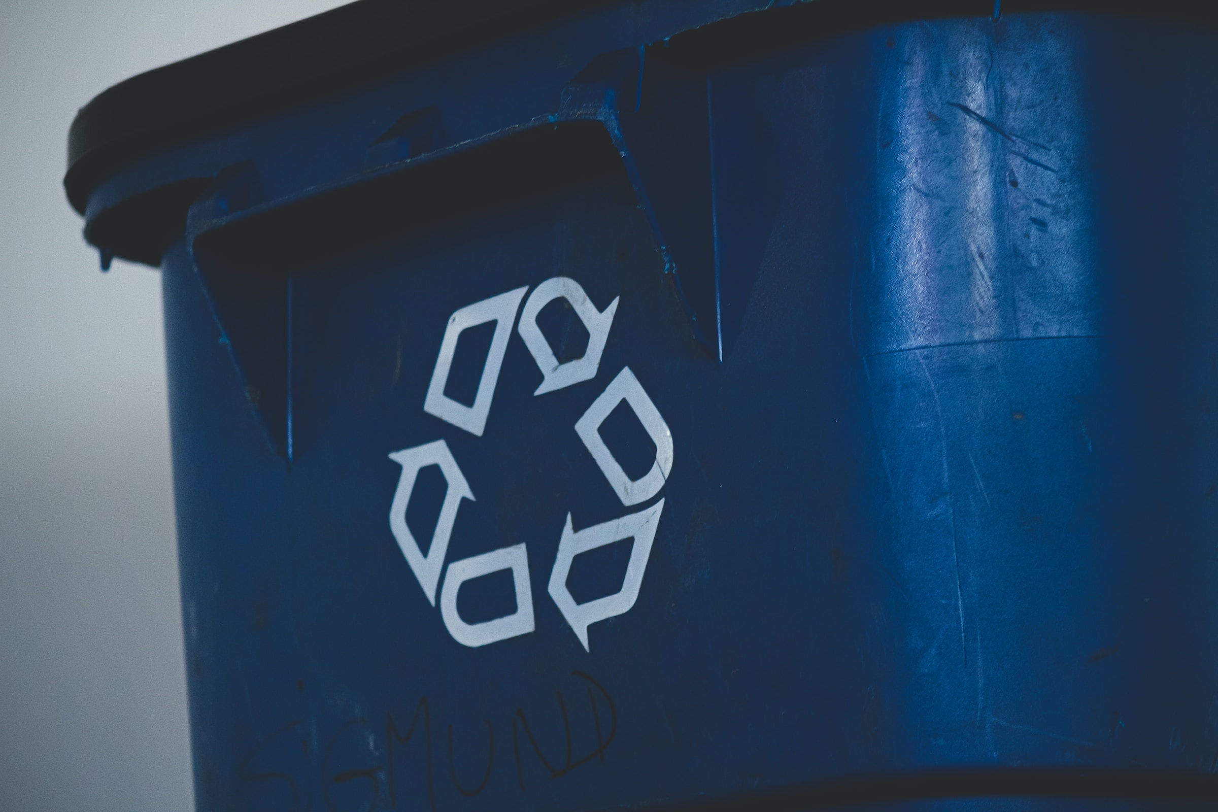 A recycling bin A recycling bin